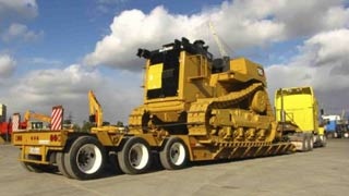 Перевозка бульдозера фото