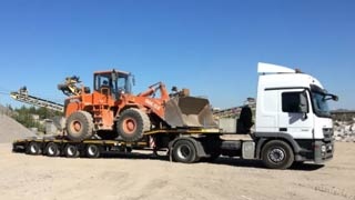 Перевозка спецтехники фото