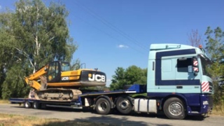 Перевозка экскаватора фото